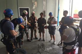 Nine students grouped together to train for rope access training