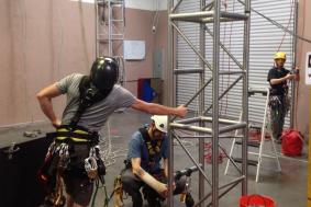 Technicians preparing facility for to practice rope access training
