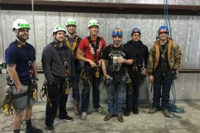 Students preparing for rope access training at training facility