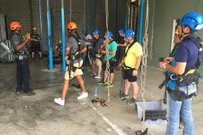 Rope access instructor talking to class